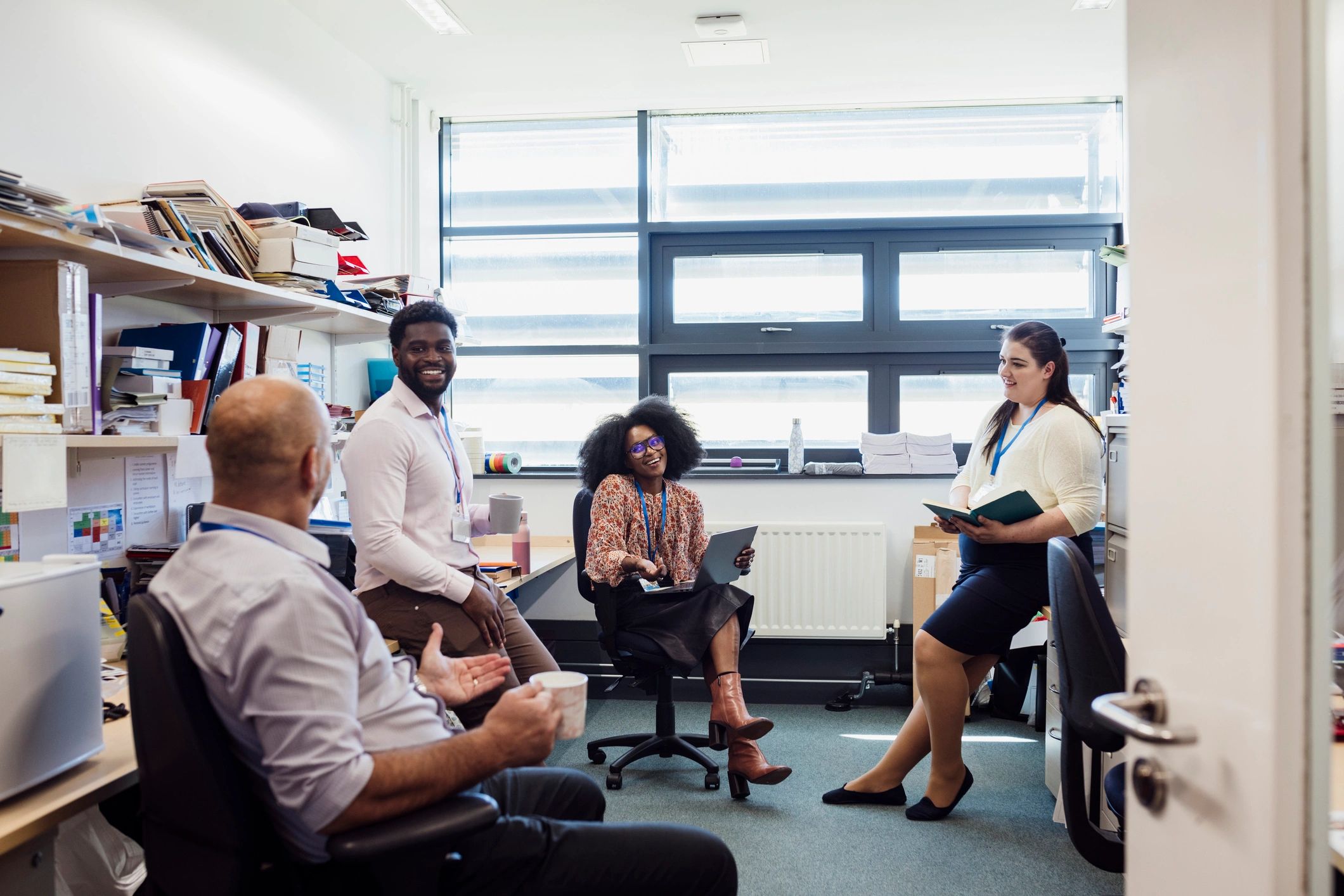 A diverse team collaborating in a modern office setting.